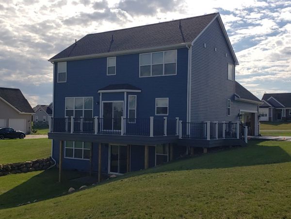 Island mist w/ White Transcend post and black Trex Signature railings