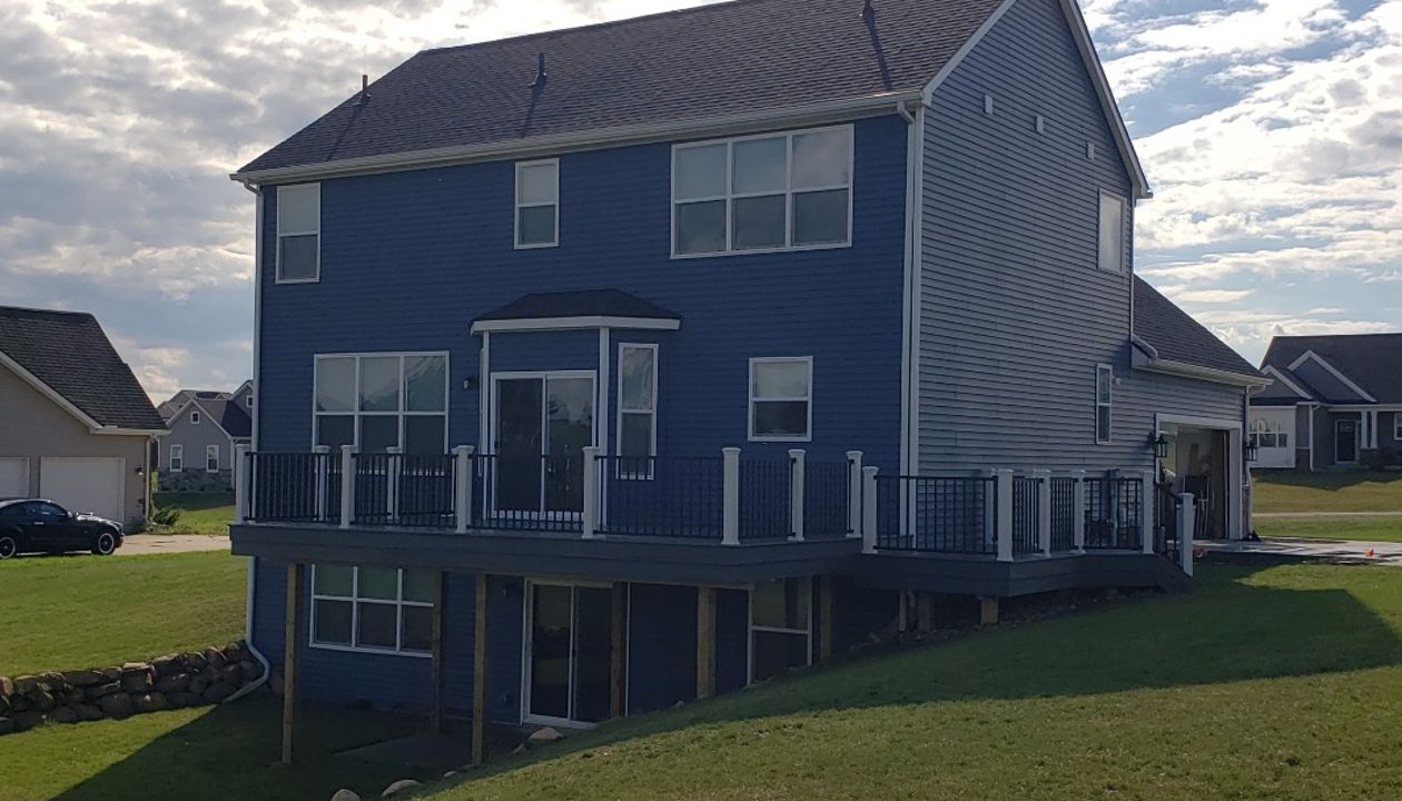 Island mist w/ White Transcend post and black Trex Signature railings