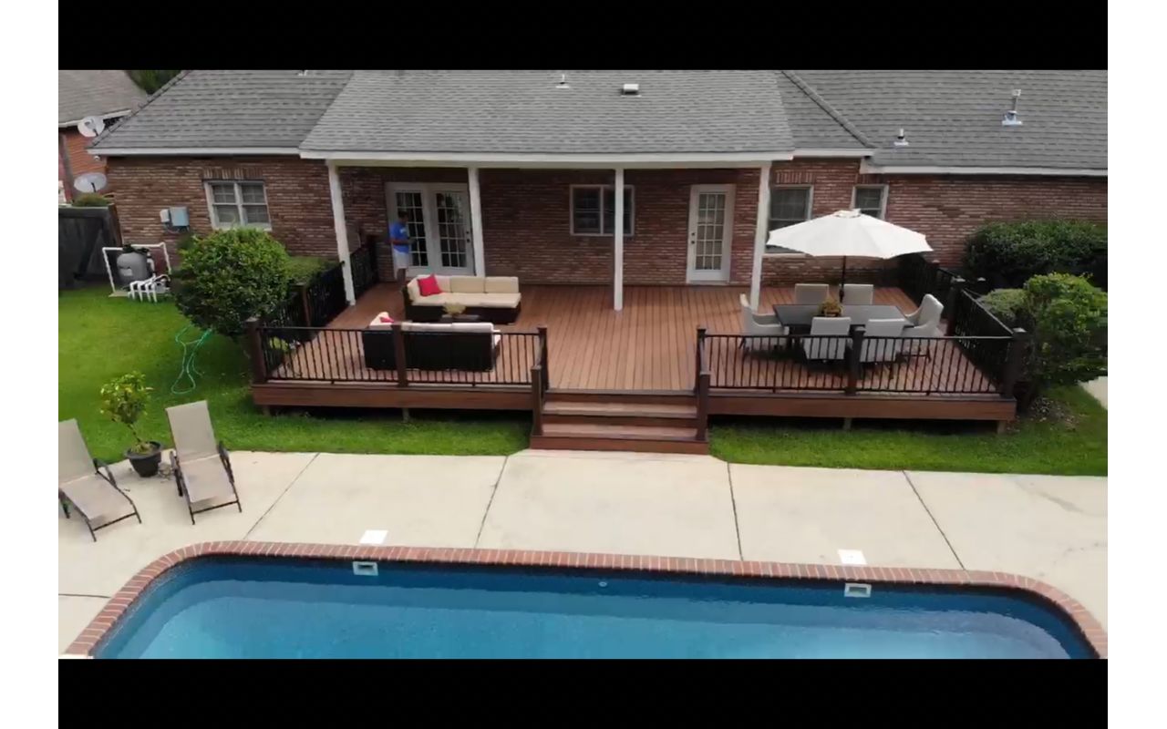 Tiki Torch Decking, Picture Frame in Lava Rock with Signature Black Railing