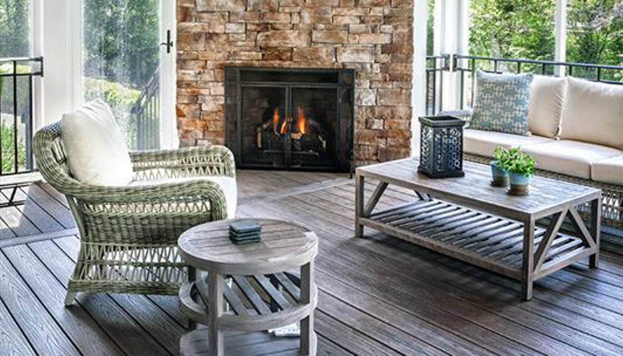 Nothing to see here except for one awe-inspiring closed-in deck — thanks to this Spiced Rum Trex Transcend decking installed with Trex hidden fasteners.