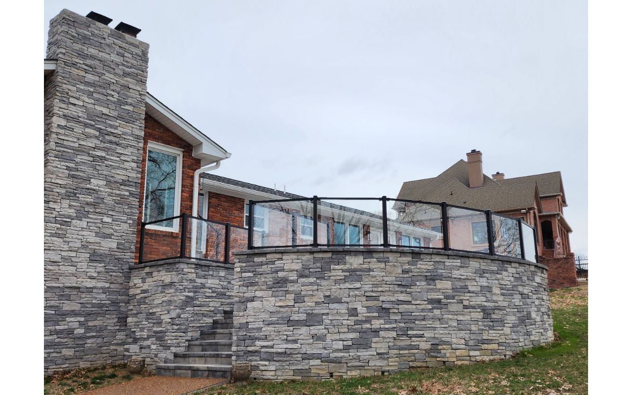 Trex Signature Glass handrails installed on this custom stone patio we built in Hendersonville, TN