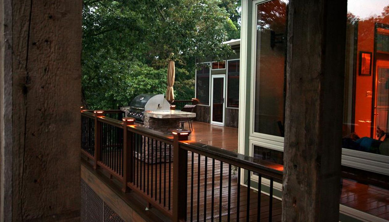 Havana Gold with spiced rum border. Tiki torch rail with black round balusters.