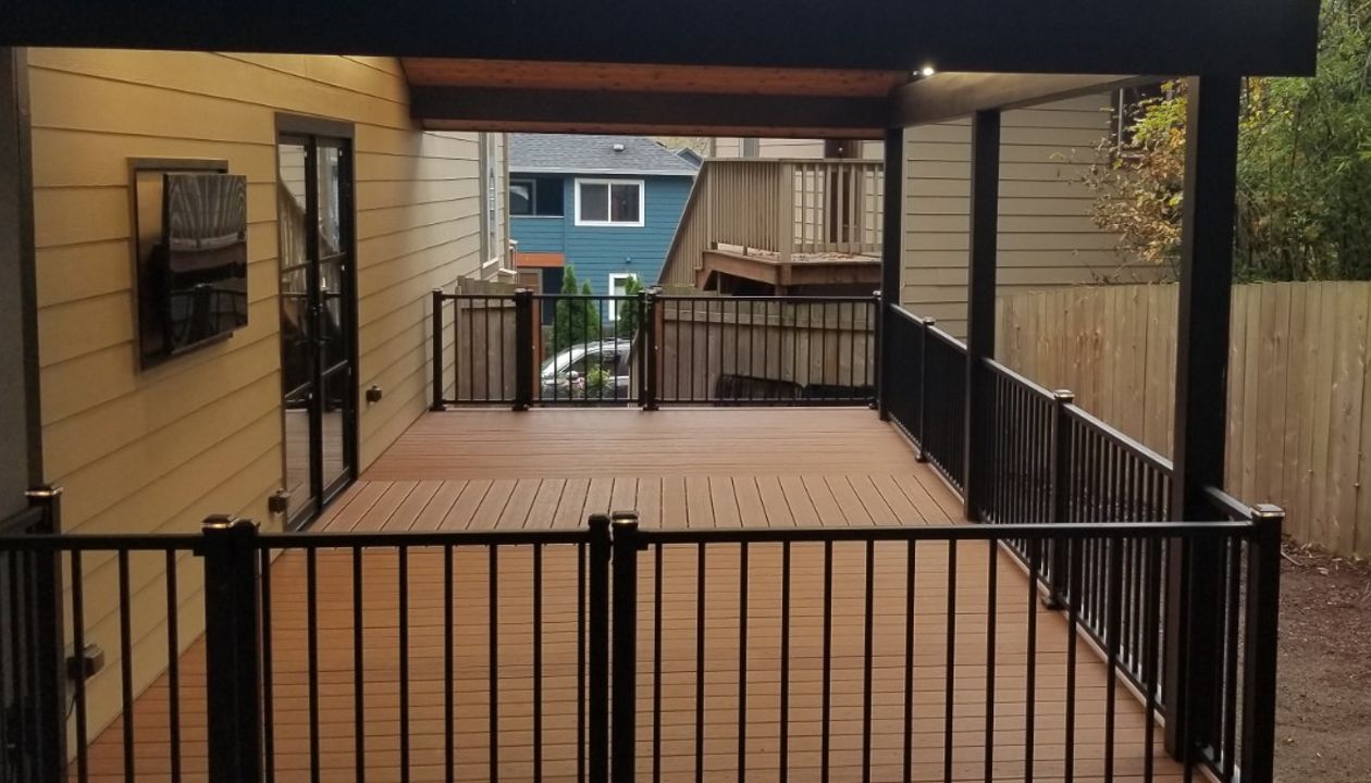 Transcend Tiki Torch decking, Signature railing, lighted post caps and riser lights