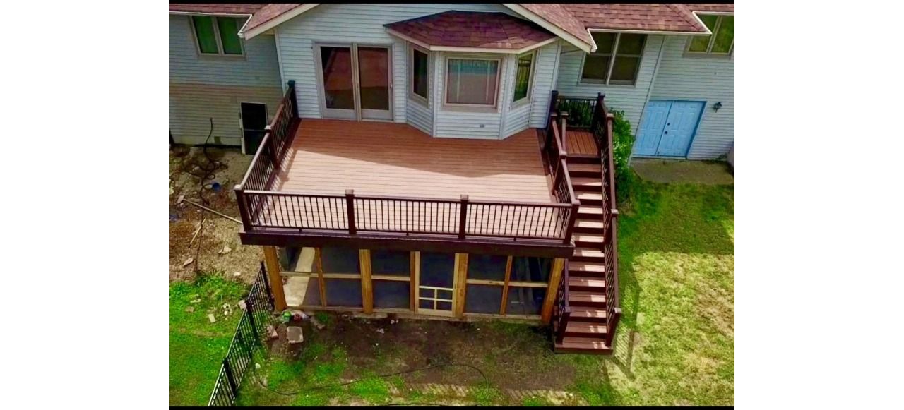 Trex deck with Rain escape and screen room below in Indianapolis