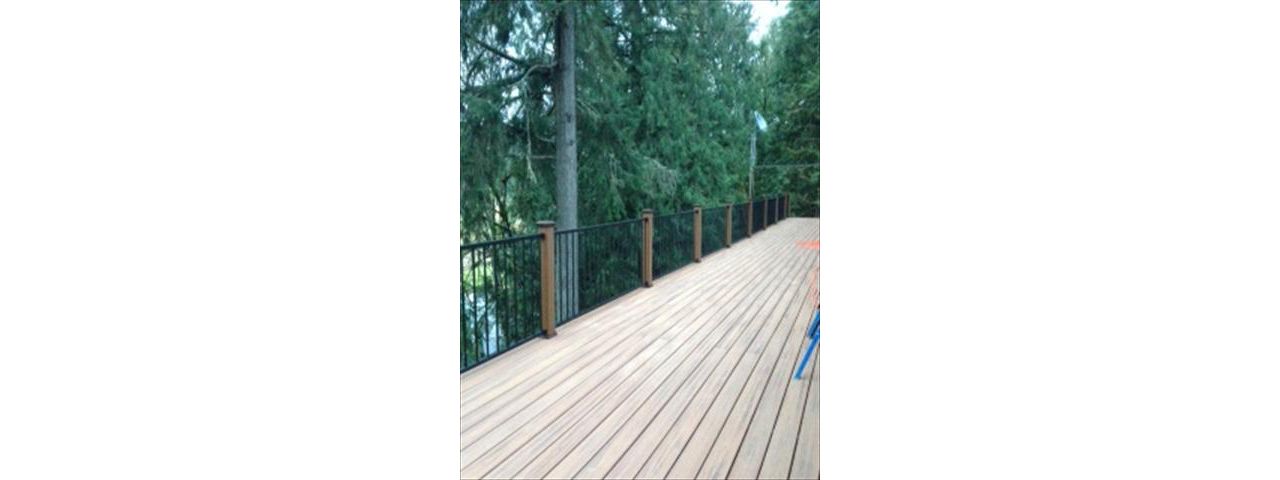 Hillsboro, OR Deck Trex Tiki Torch and Reveal Aluminum Rail