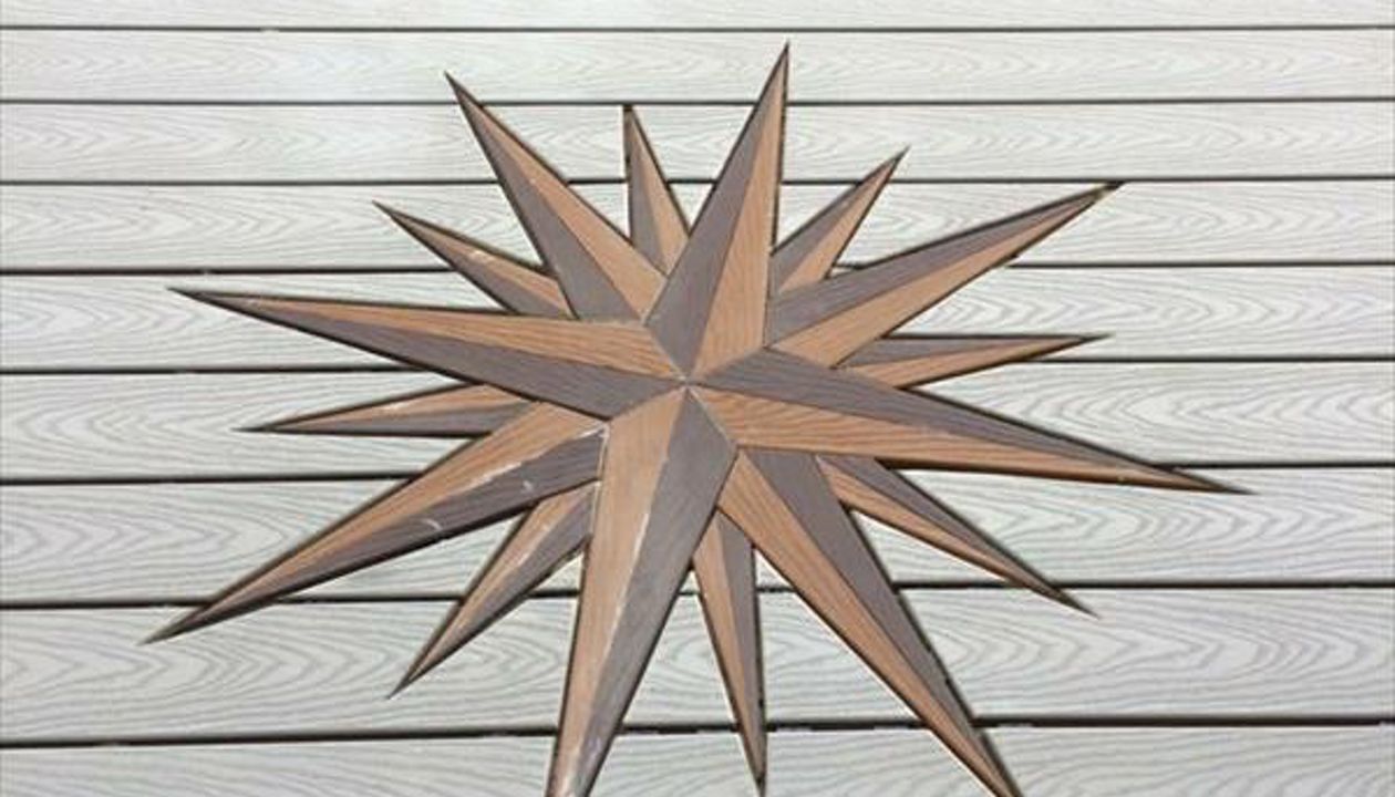 Another deck showing our signature mariners compass.  N SKY even orientated to point true north!