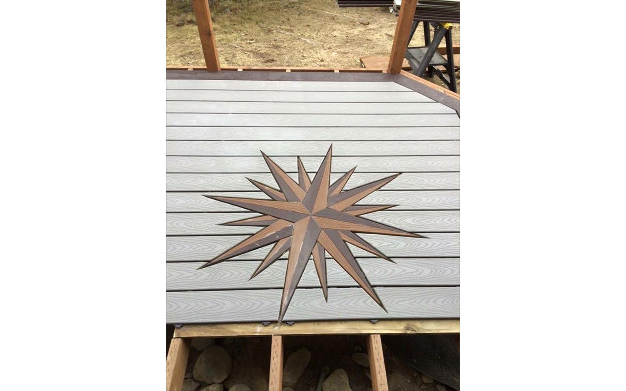 Another deck showing our signature mariners compass.  N SKY even orientated to point true north!