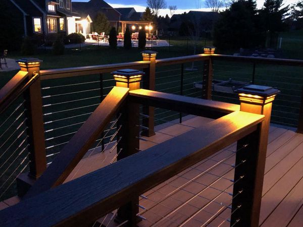 Trex Transcend Tropics Tiki Torch deck boards with Transcend Vintage Lantern Rails, fascia serving the Twin Cites, Post cap lights, deck lighting, picture frame, drink rail, hidden fasteners, Hastings, Woodbury, Egan, Edina, Minneapolis, Lake of the Isles