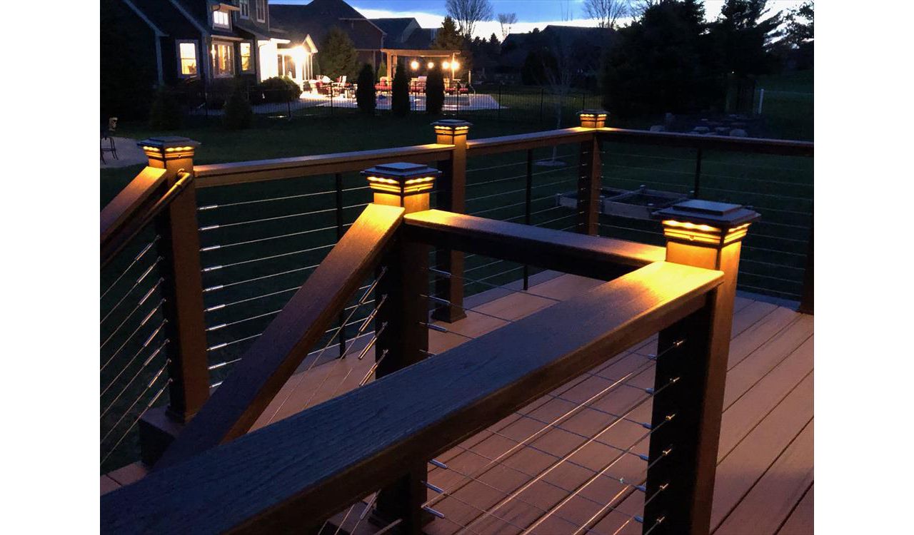 Trex Transcend Tropics Tiki Torch deck boards with Transcend Vintage Lantern Rails, fascia serving the Twin Cites, Post cap lights, deck lighting, picture frame, drink rail, hidden fasteners, Hastings, Woodbury, Egan, Edina, Minneapolis, Lake of the Isles