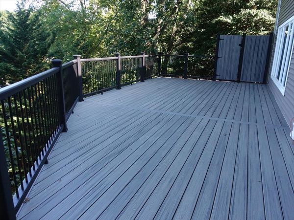 Centerport Trex island mist 2nd floor deck with custom door