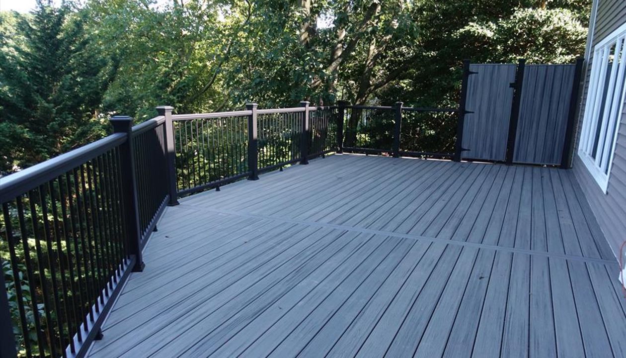 Centerport Trex island mist 2nd floor deck with custom door