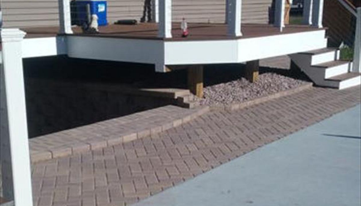 Deck around pool with paver patio