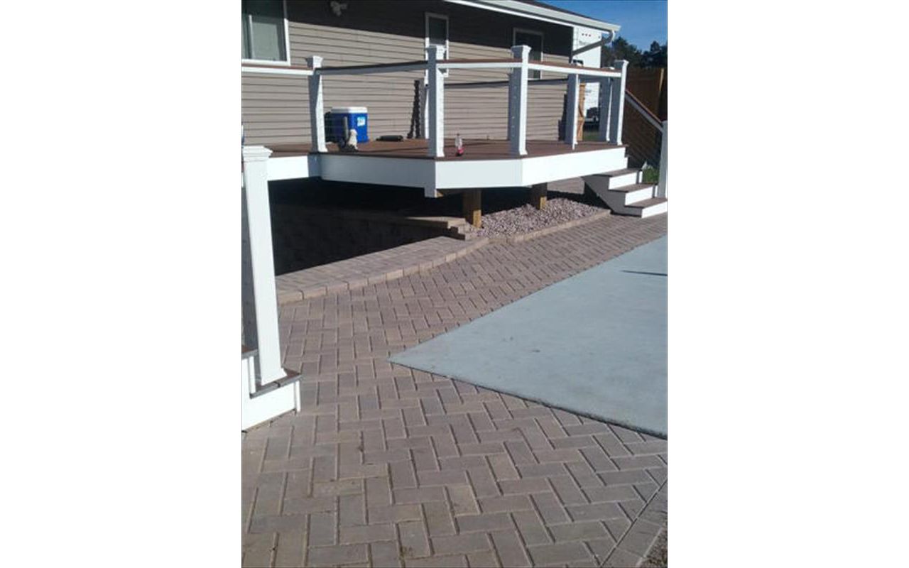 Deck around pool with paver patio