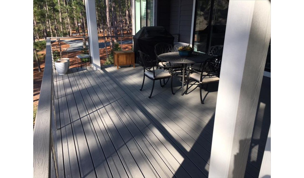 Great grilling and socializing area off the kitchen on this Pinehurst masterpiece