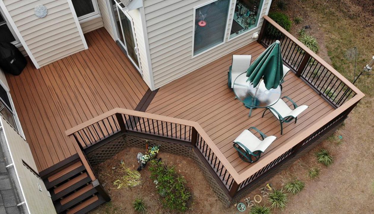 Transcend Tiki Torch field decking with a nice contrasting Lava Rock picture frame. Great details on the stair treads!