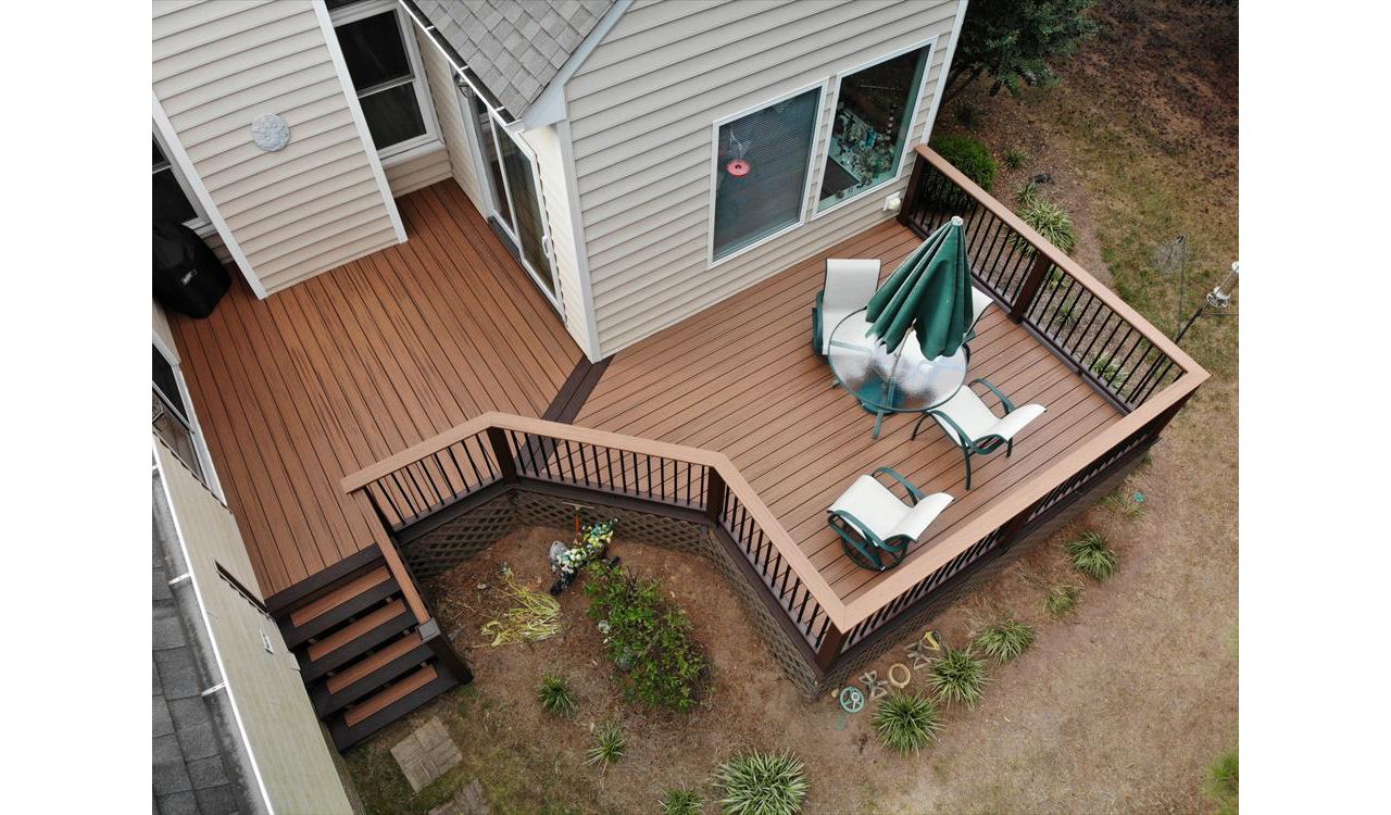 Transcend Tiki Torch field decking with a nice contrasting Lava Rock picture frame. Great details on the stair treads!