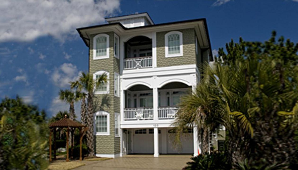 Beautiful custom porches on this home on Figure 8 Island, NC.