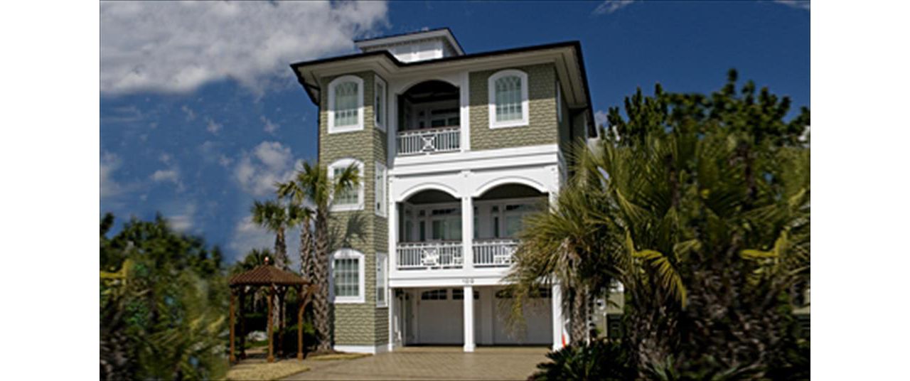 Beautiful custom porches on this home on Figure 8 Island, NC.