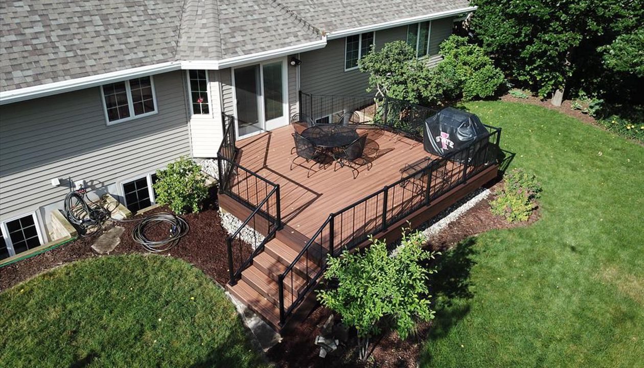 Transcend Decking - Tiki Torch main field with Lava Rock Picture frame/ fascia.