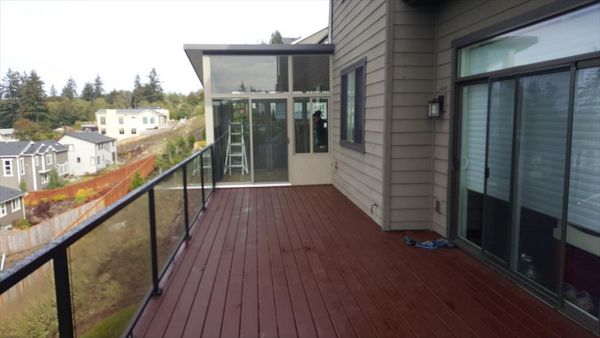 Madeira decking Rain Escape below. New Sunroom