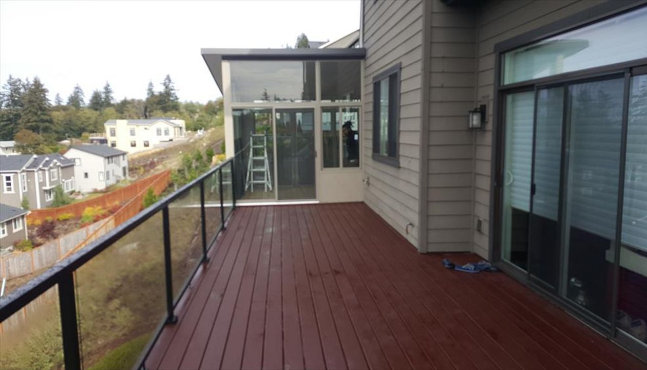 Madeira decking Rain Escape below. New Sunroom