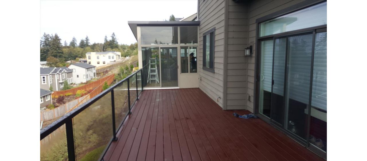 Madeira decking Rain Escape below. New Sunroom