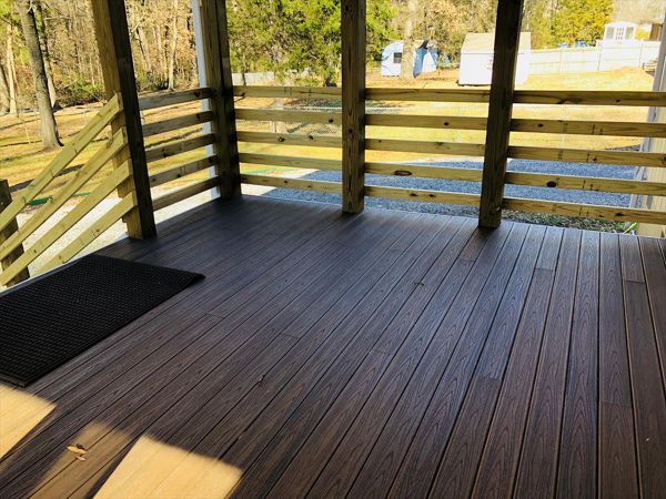 Deck to covered porch project with Trex Spiced Rum Porch Boards