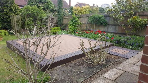 Tiki Torch with a Lava Rock picture frame for an entertaining area with lights fitted to increase the usage of the area.