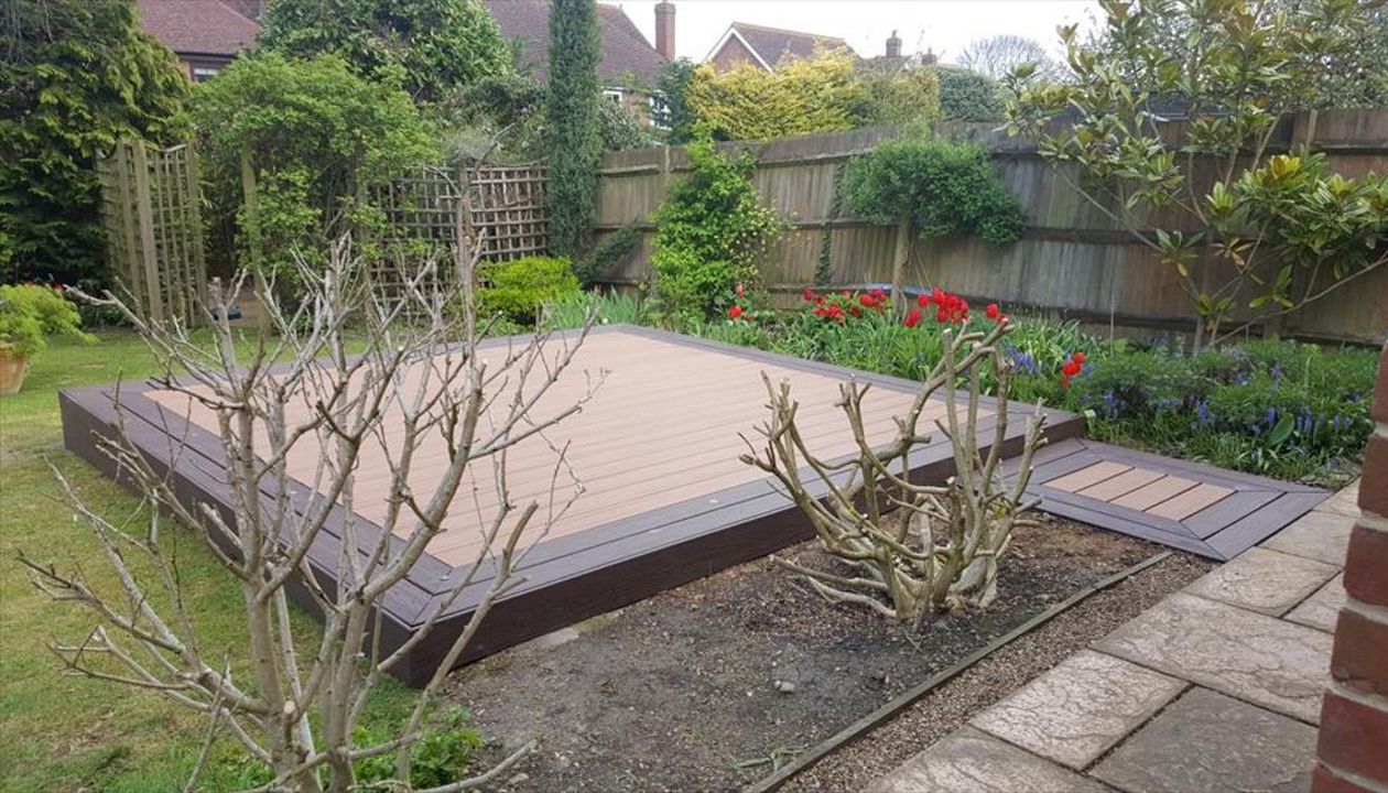 Tiki Torch with a Lava Rock picture frame for an entertaining area with lights fitted to increase the usage of the area.