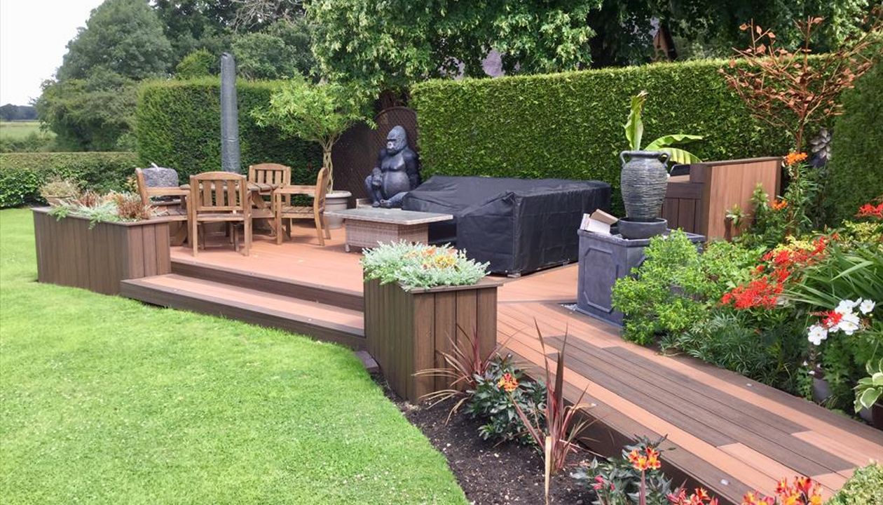 My home deck - lockdown project Trex Transcend Tiki Torch with Trex Transcend Spiced Rum picture frame and inlay design…