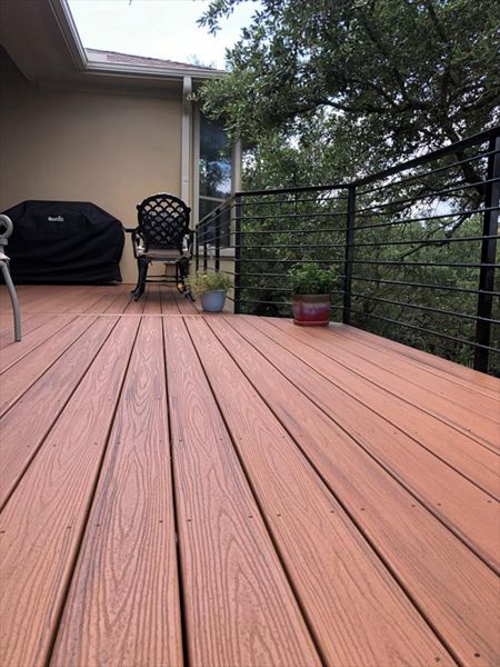 Nice shaded back yard with Trex Transcend Tiki Torch by Austin Deck Company, Austin TX