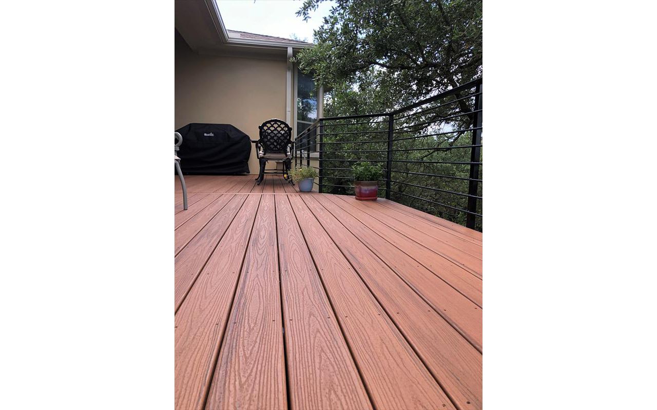 Nice shaded back yard with Trex Transcend Tiki Torch by Austin Deck Company, Austin TX