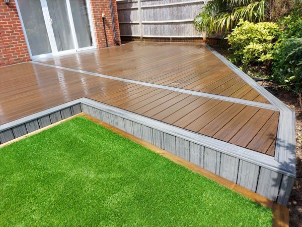 Trex Transcend Lava Rock main area. Trex Transcend island mist outer field. Project in Hamstreet