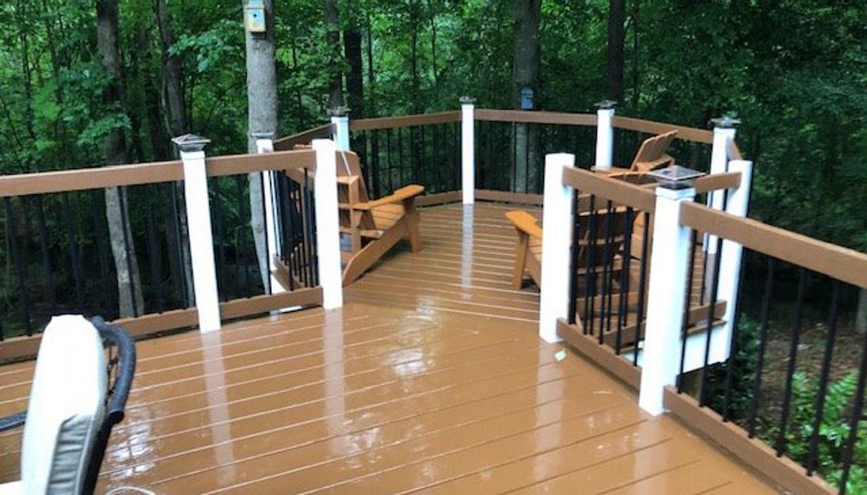 This drop down octagonal deck offers a great visual and extended living space with a view!