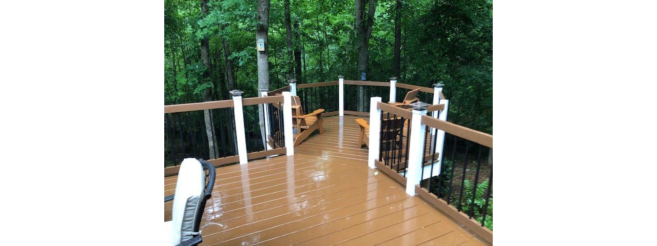 This drop down octagonal deck offers a great visual and extended living space with a view!