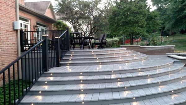 Signature black railing and Trex lighting used with non-Trex decking