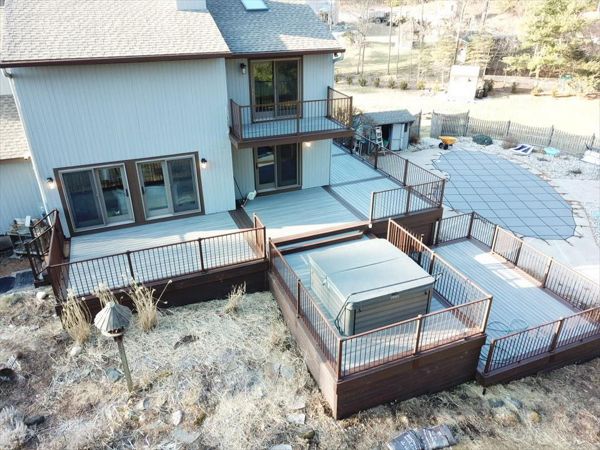 Trex Transcends Island Mist Decking with Lava Rock Board/Partitions & Skirting with Trex Signature Bronze Railing System