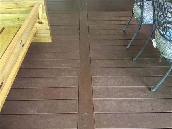 Trex Enhance feature board provides great visual divide for this porch project