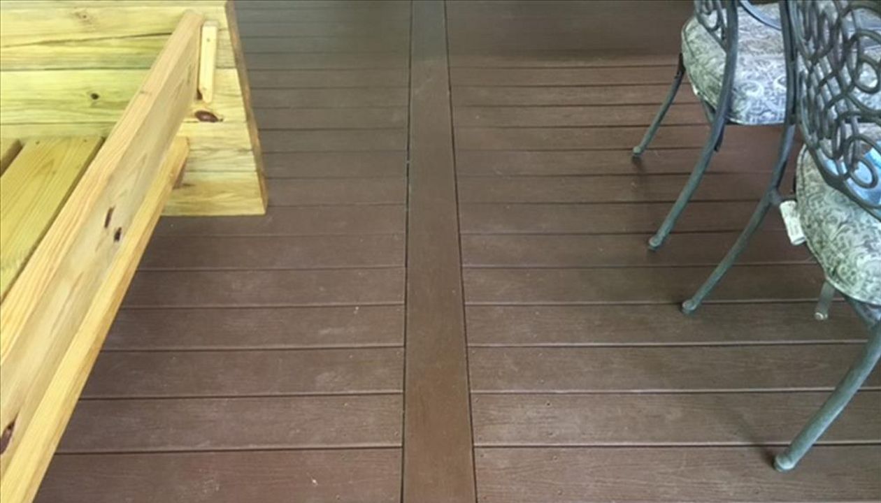 Trex Enhance feature board provides great visual divide for this porch project