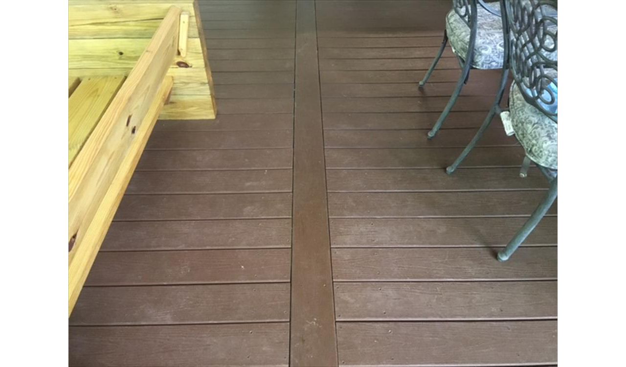 Trex Enhance feature board provides great visual divide for this porch project