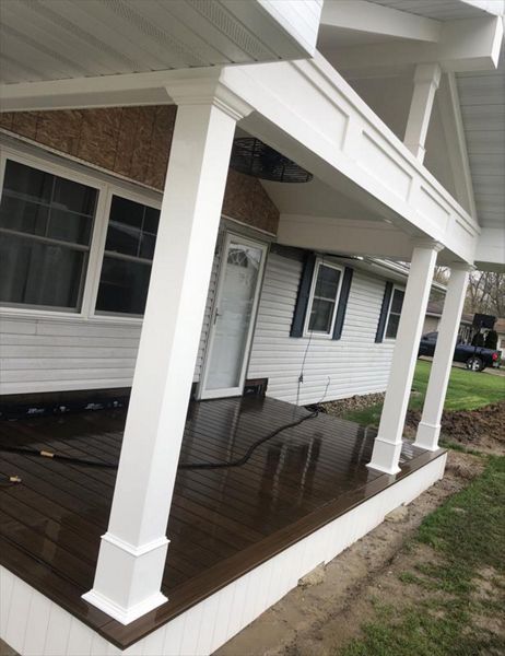 Front porch addition trimmed with Versatex trim and Trex Transcend spiced rum decking.