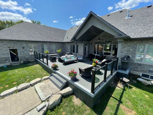 Main: Trex Enhance Basics in Clam Shell. Trim: Trex Enhance Naturals in Foggy Wharf. Contact Align Decking today for your custom composite decking needs. Servicing Toronto, Durham Region, Kawartha Lakes, and the Barrie & Orillia areas.