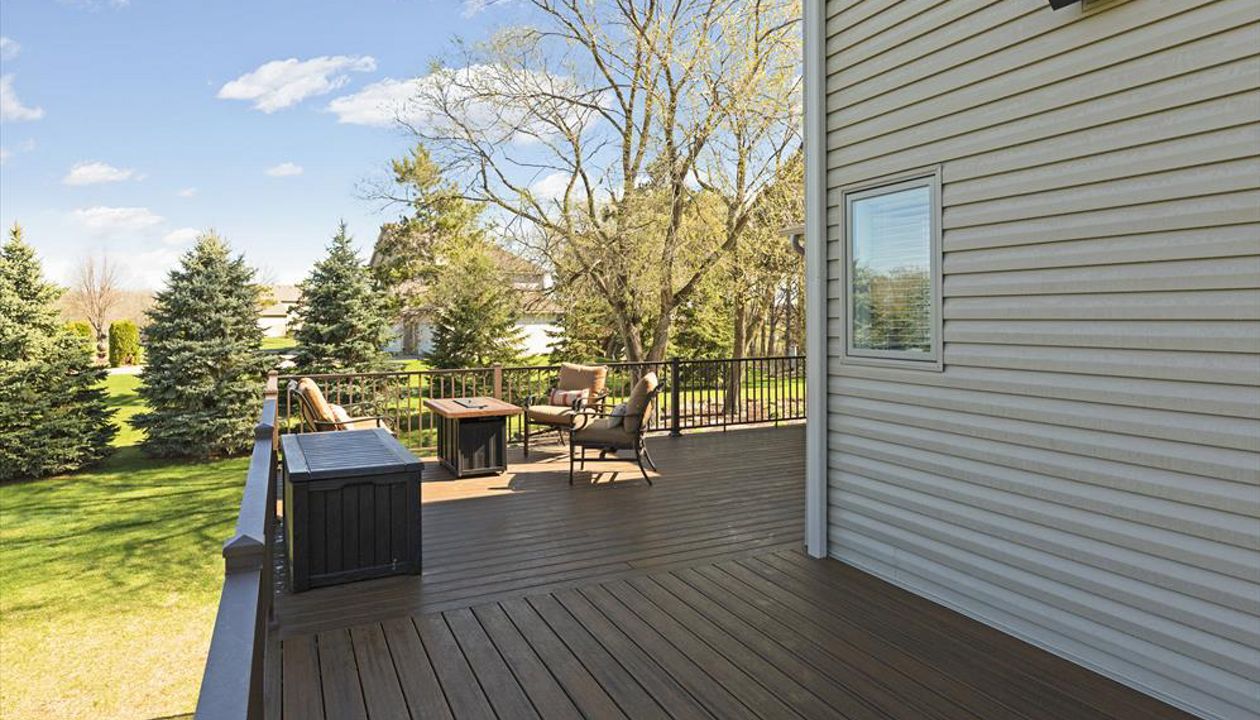 Low Maintenance Trex Composite Decking in Spiced Rum Color with Aluminum Railing in Rogers, MN Area