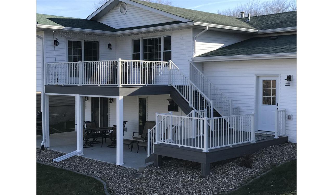 Trex Transcends Tropical Island Mist Multi-Level Deck &amp; Stairs Cedar Rapids Iowa; White Signature Aluminum Railings With Cross Over Brackets For The Stair Railings