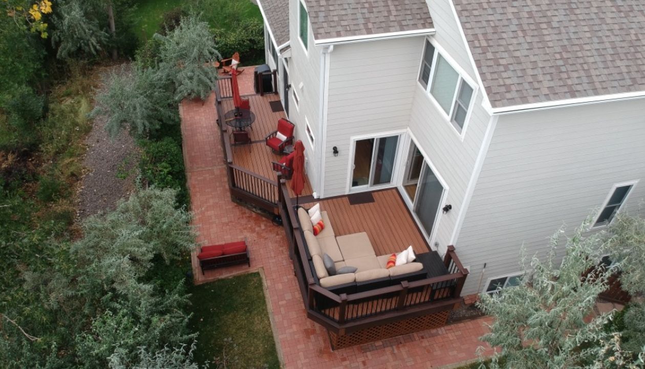 Tiki Torch and Lava Rock Deck, Trex Signature Aluminum Railing Aurora Colorado