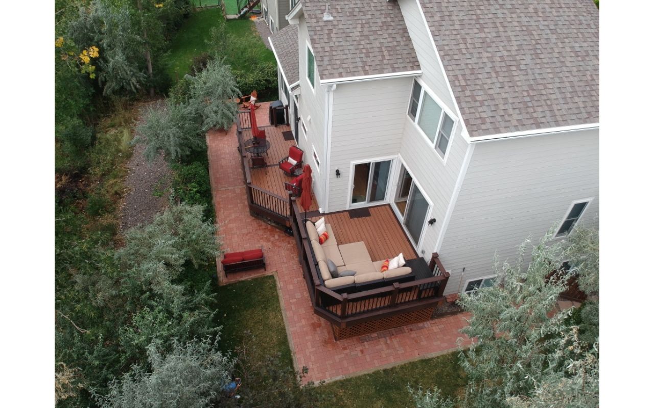 Tiki Torch and Lava Rock Deck, Trex Signature Aluminum Railing Aurora Colorado