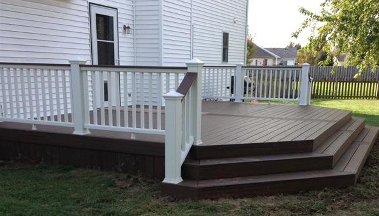 Lava Rock Deck with Trancend railing with a drink ledge