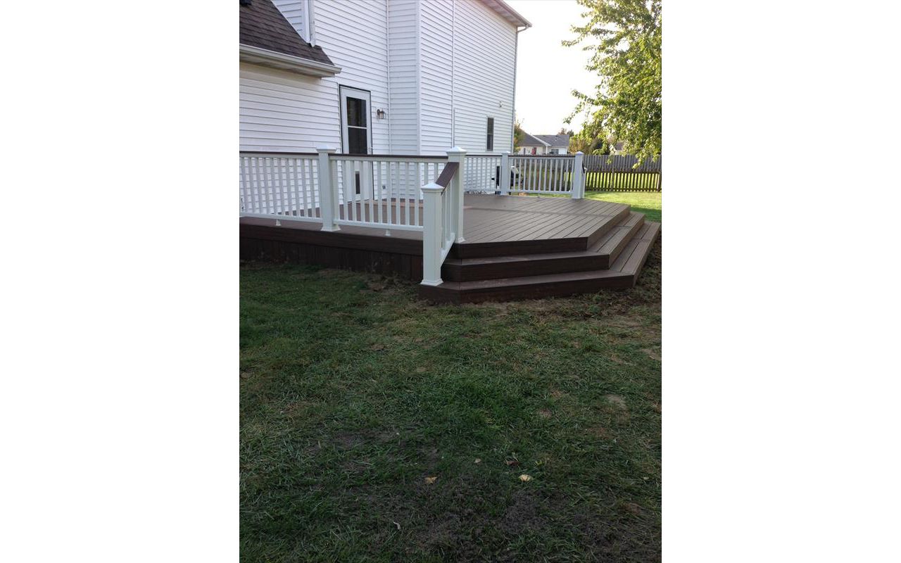 Lava Rock Deck with Trancend railing with a drink ledge