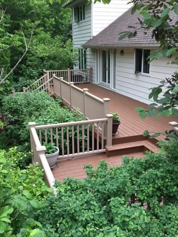 Tree House Deck; Rope Swing Railing nestled in the garden
