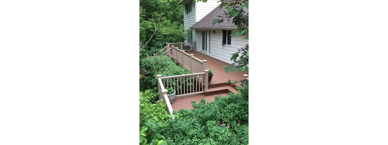Tree House Deck; Rope Swing Railing nestled in the garden